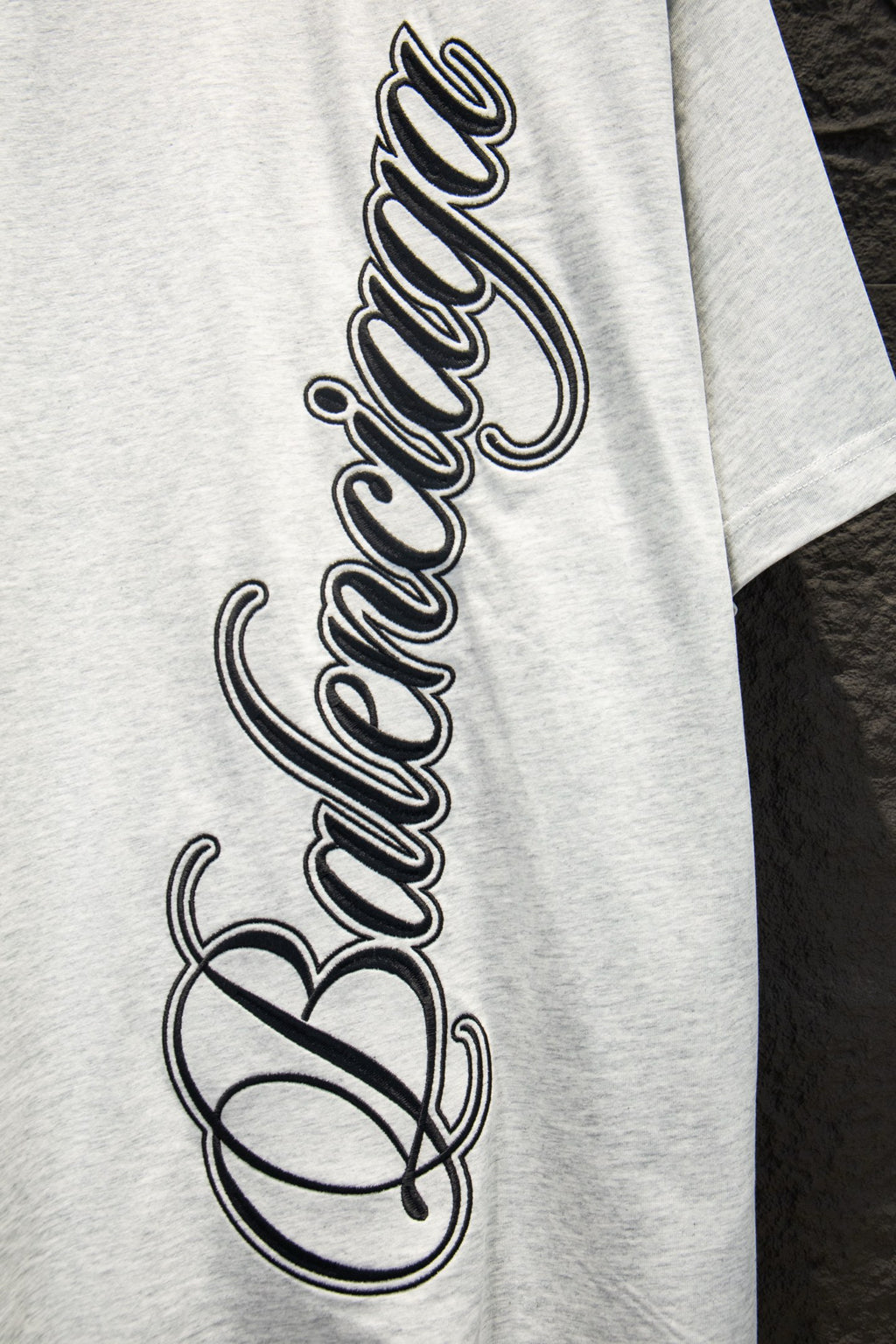 White T-shirt with large black Balenciaga script graphic on chest