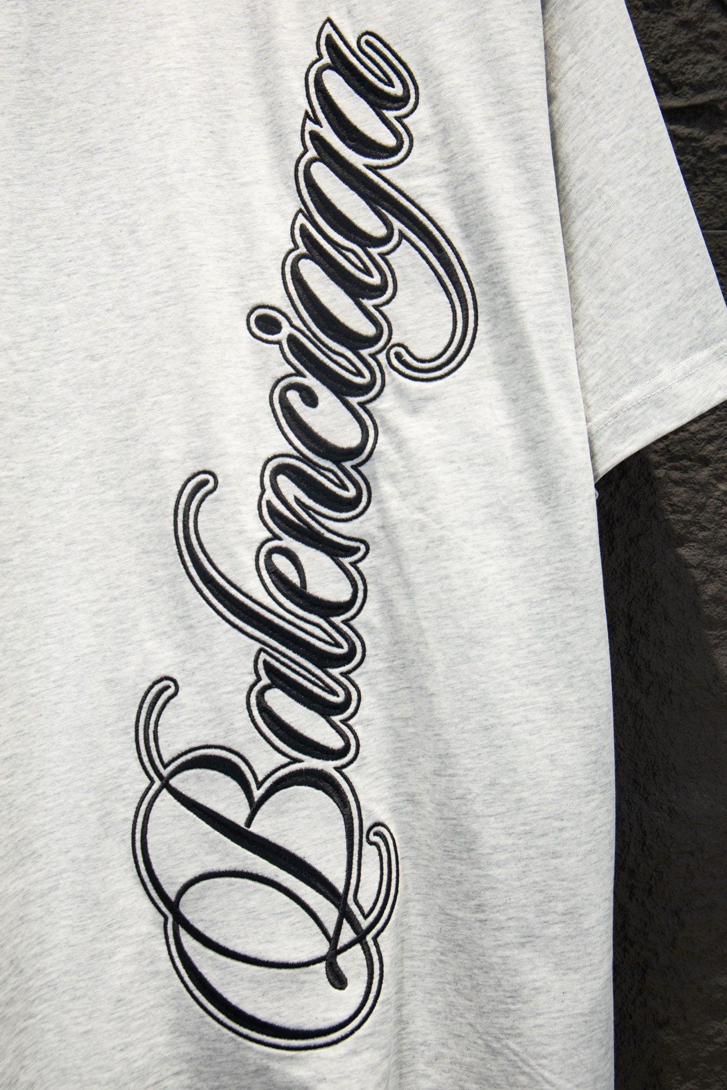 White T-shirt with large black Balenciaga script graphic on chest
