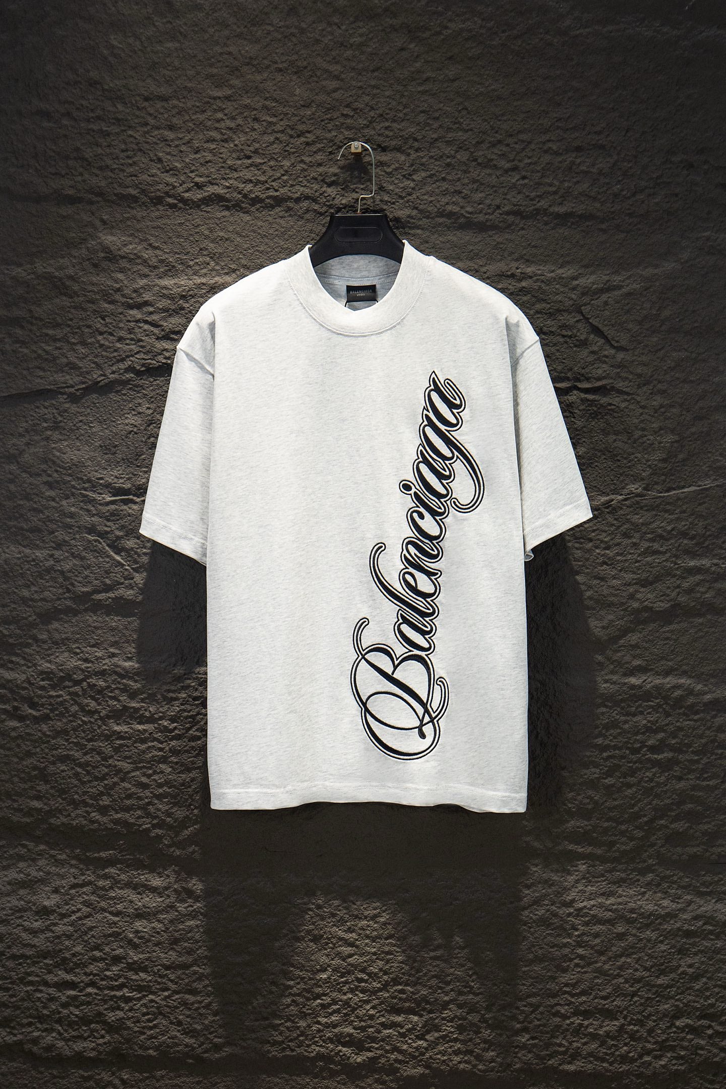 White Balenciaga T-shirt with large black script graphic on front