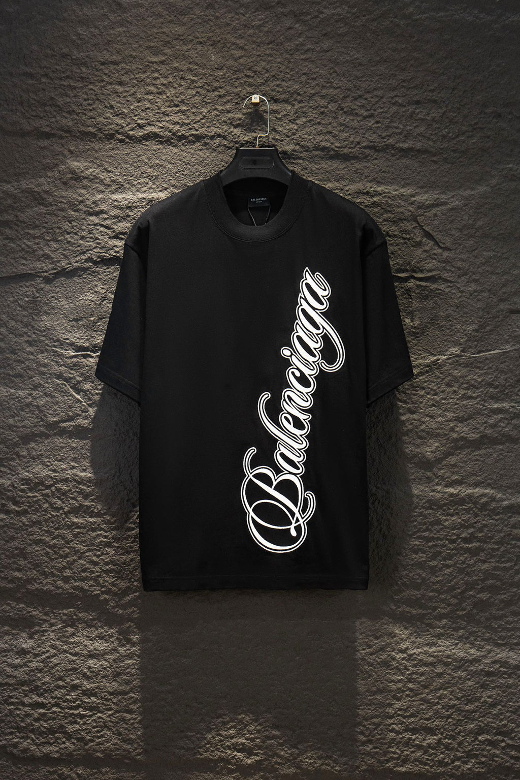 Balenciaga short-sleeve T-shirt in black with large white script logo on front
