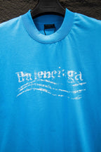 Balenciaga short-sleeve T-shirt, light blue, distressed front graphic text