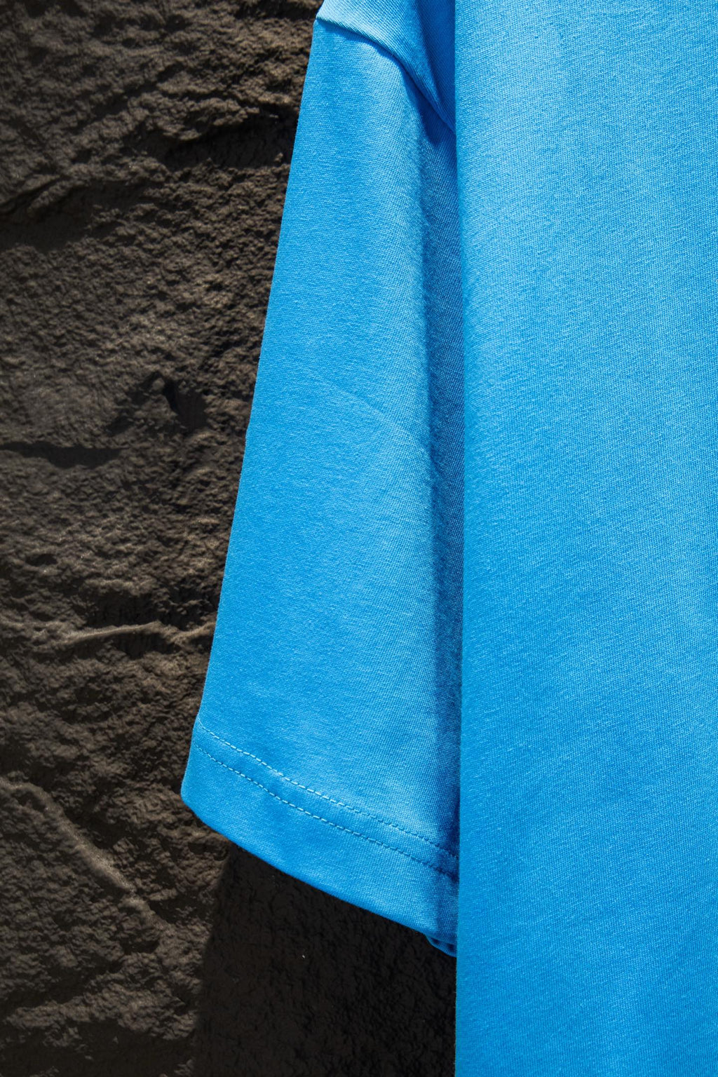 Balenciaga short-sleeve T-shirt sleeve close-up, light blue