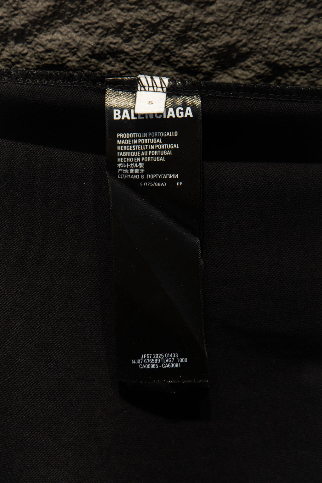 Balenciaga T-shirt fabric label near side seam with size and care info