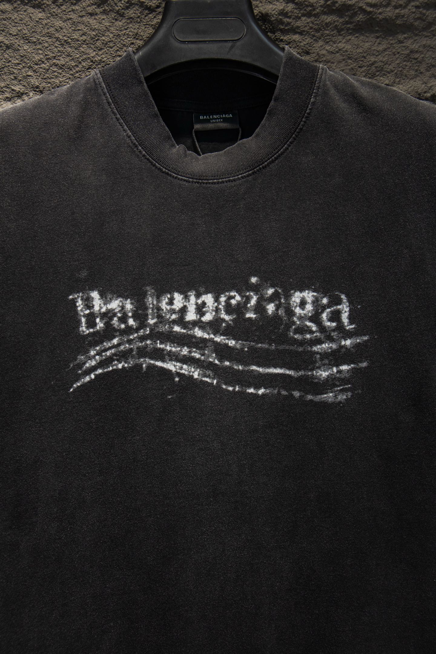 Black Balenciaga T-shirt with white distressed logo on chest