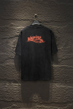 Black Balenciaga short-sleeve T-shirt with orange logo graphic