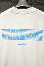 White Balenciaga T-shirt back with blue block text and small WFP BALENCIAGA mark