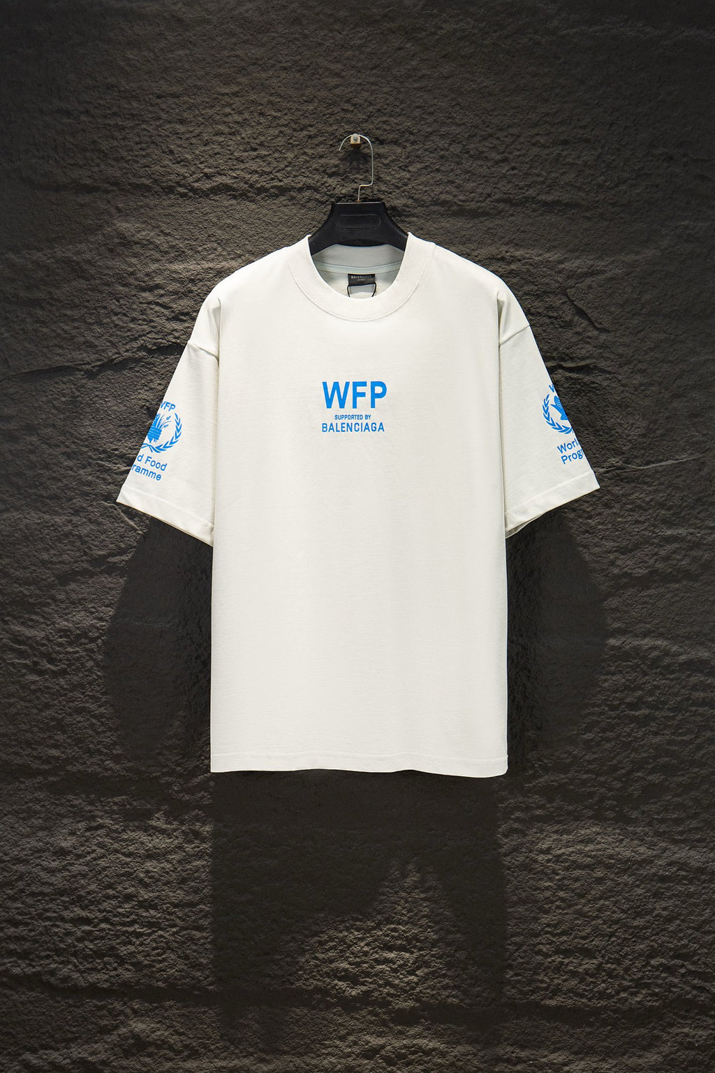 White Balenciaga T-shirt with blue WFP supported by Balenciaga logo on front