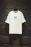 White Balenciaga T-shirt with blue WFP supported by Balenciaga logo on front