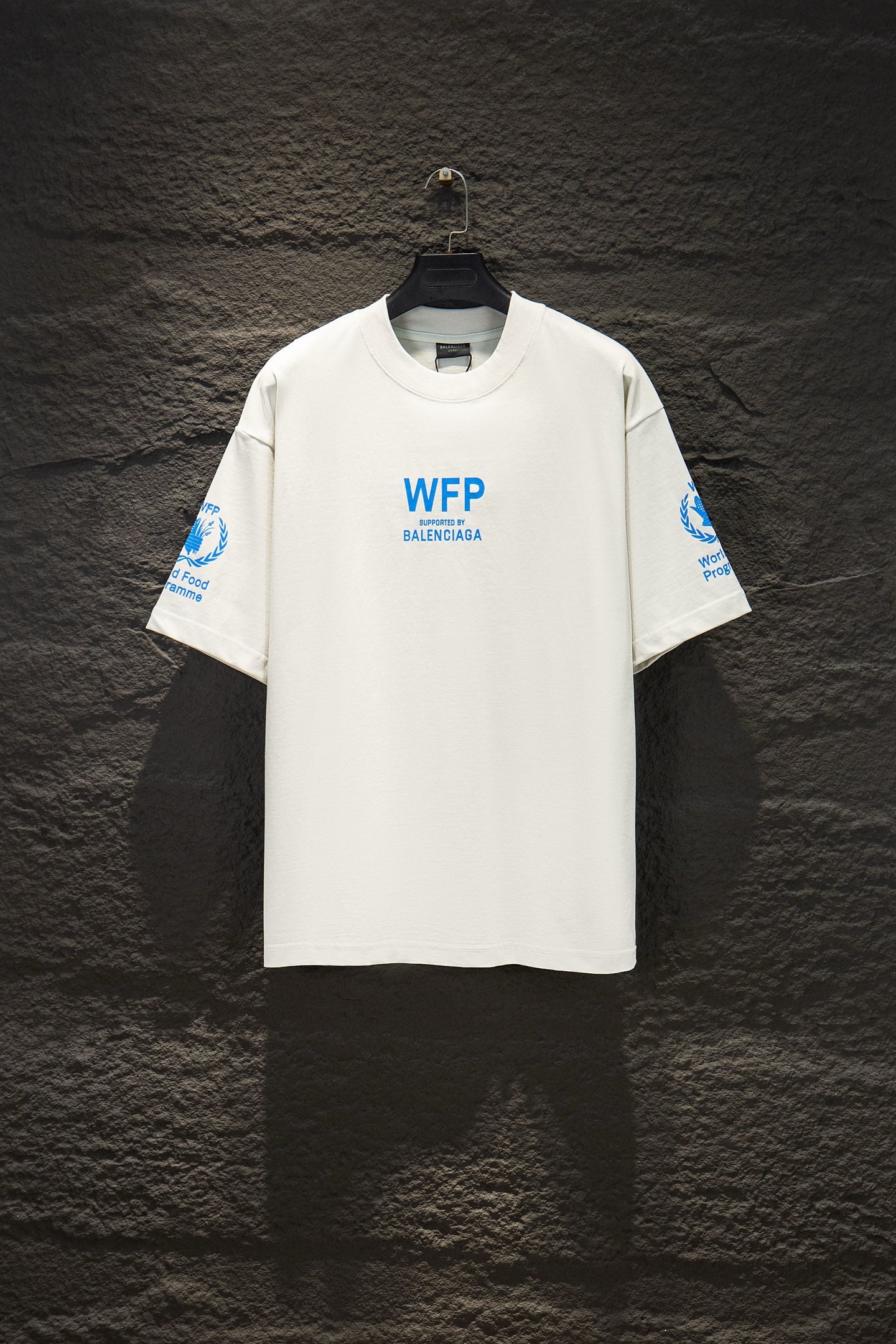 White Balenciaga T-shirt with blue WFP supported by Balenciaga logo on front