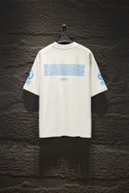 White Balenciaga T-shirt with blue text graphic on back