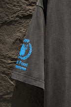 Gray T-shirt side view showing blue WFP laurel graphic and “World Food Programme”