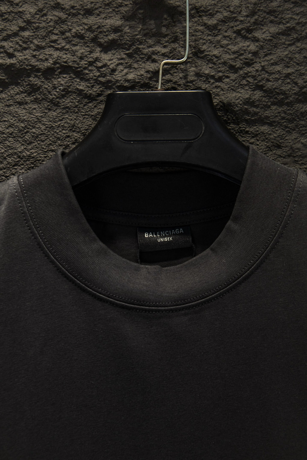 Black crewneck T-shirt neckline with inner label