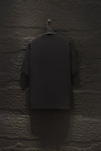 Black short-sleeve T-shirt, back view on a hanger
