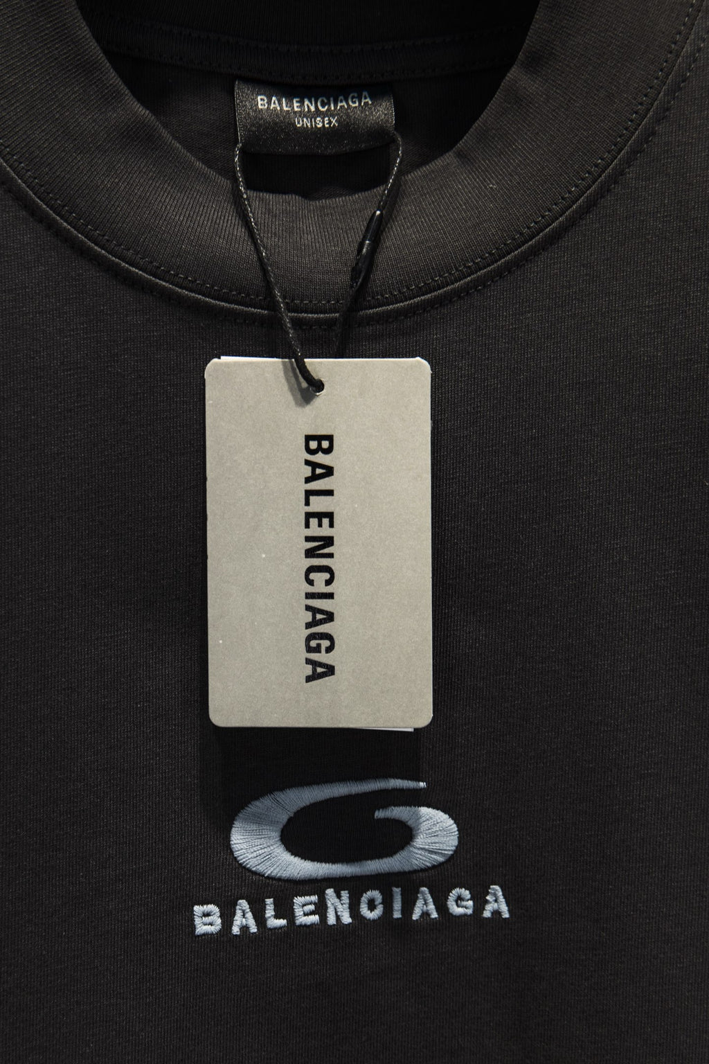 Black T-shirt with hangtag and Balenciaga logo print