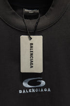 Black T-shirt with hangtag and Balenciaga logo print