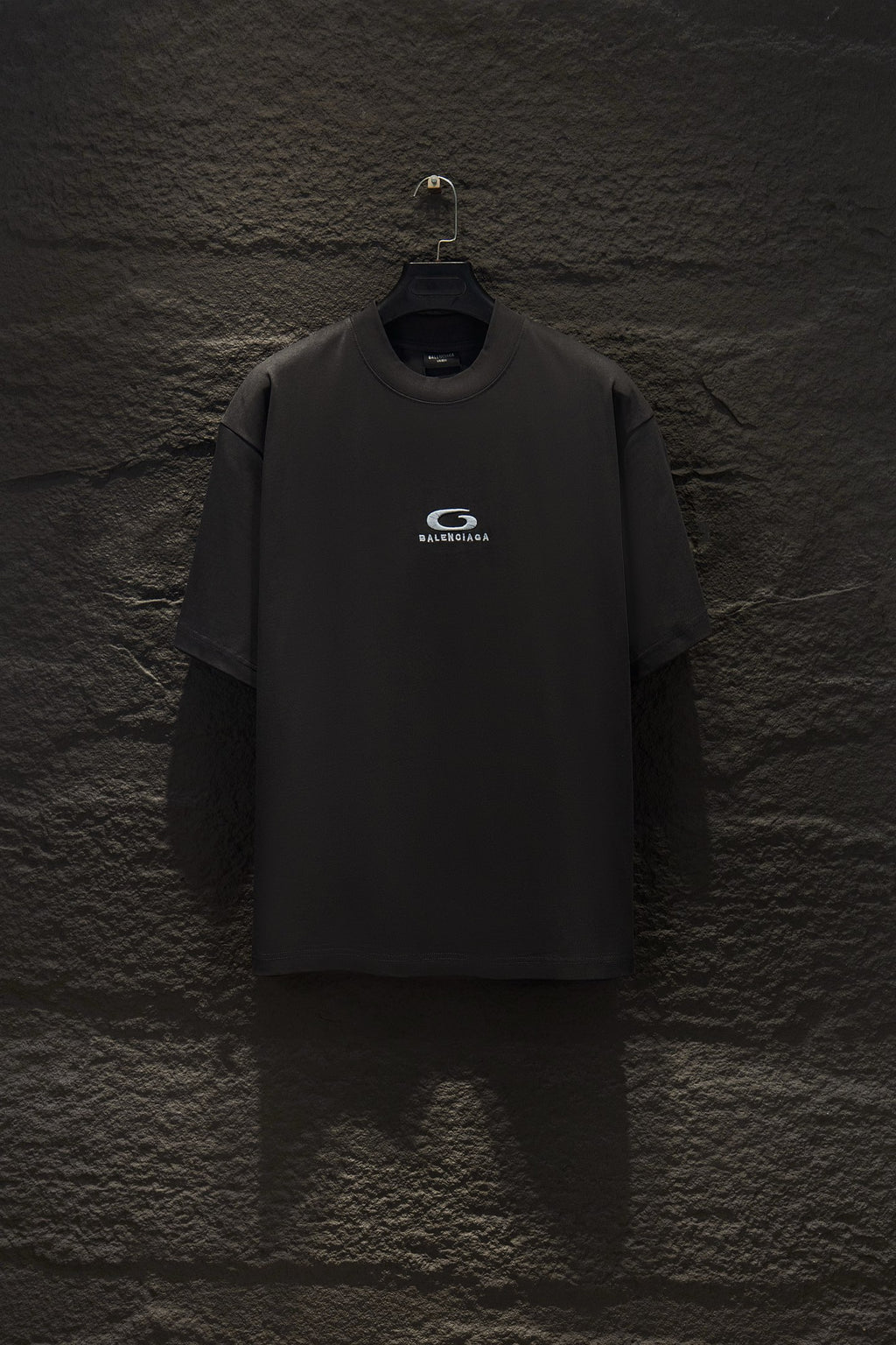 Black short-sleeve T-shirt with Balenciaga logo on the chest
