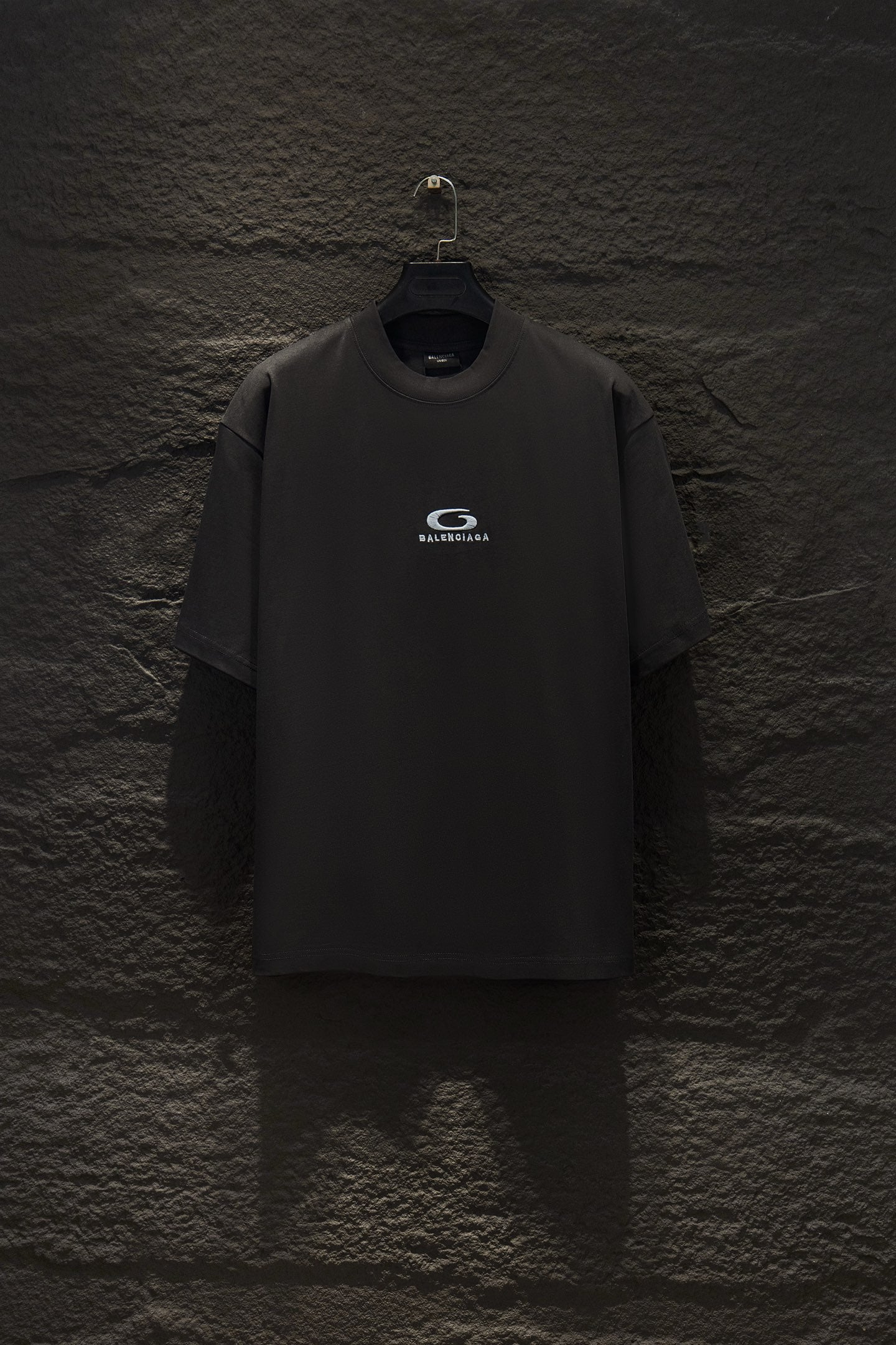 Black short-sleeve T-shirt with Balenciaga logo on the chest