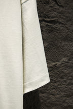 White T-shirt sleeve and side hem