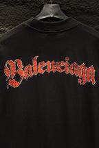 Balenciaga short-sleeve T-shirt front with large red Balenciaga logo lettering