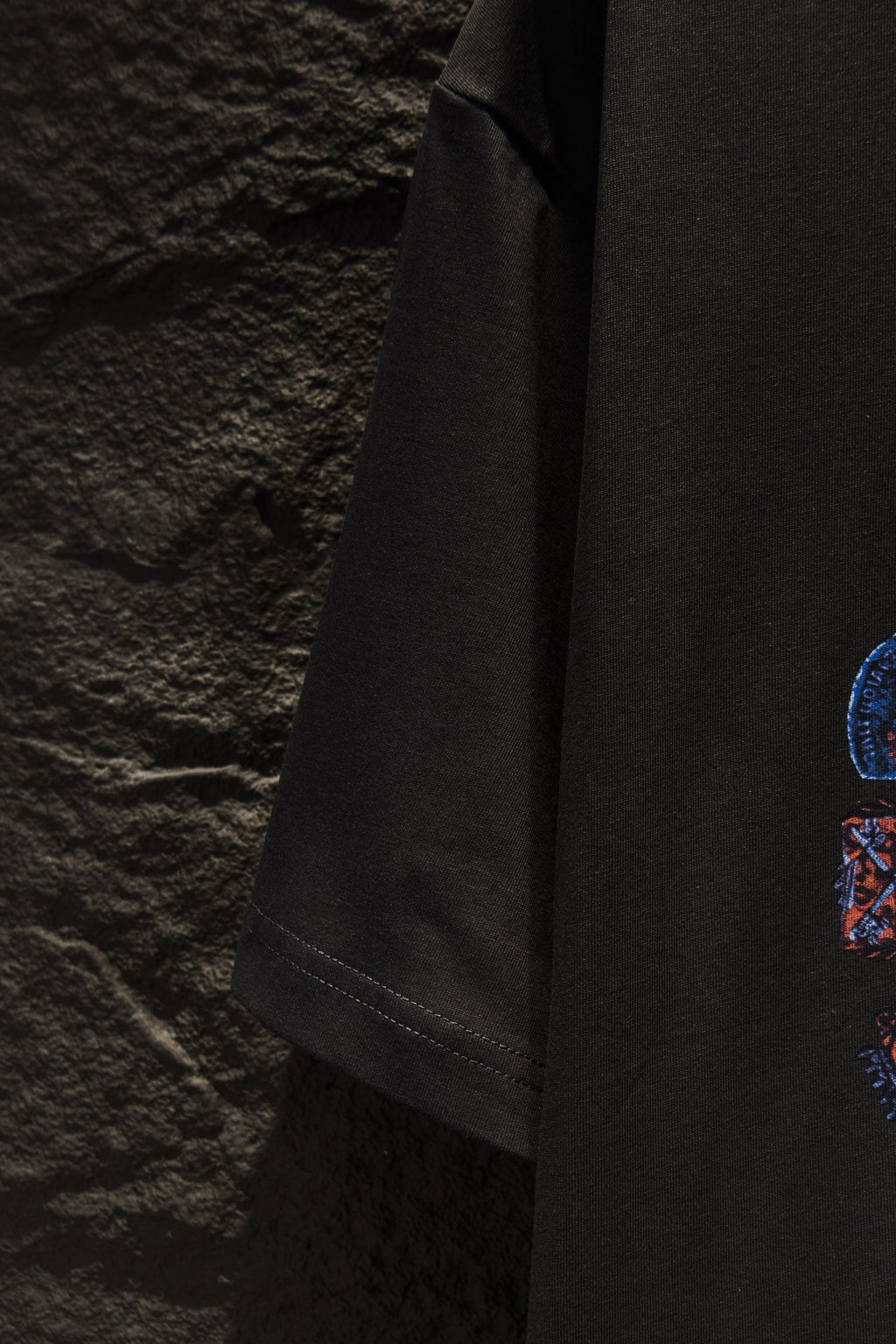 Balenciaga short-sleeve T-shirt side view with graphic print partially visible