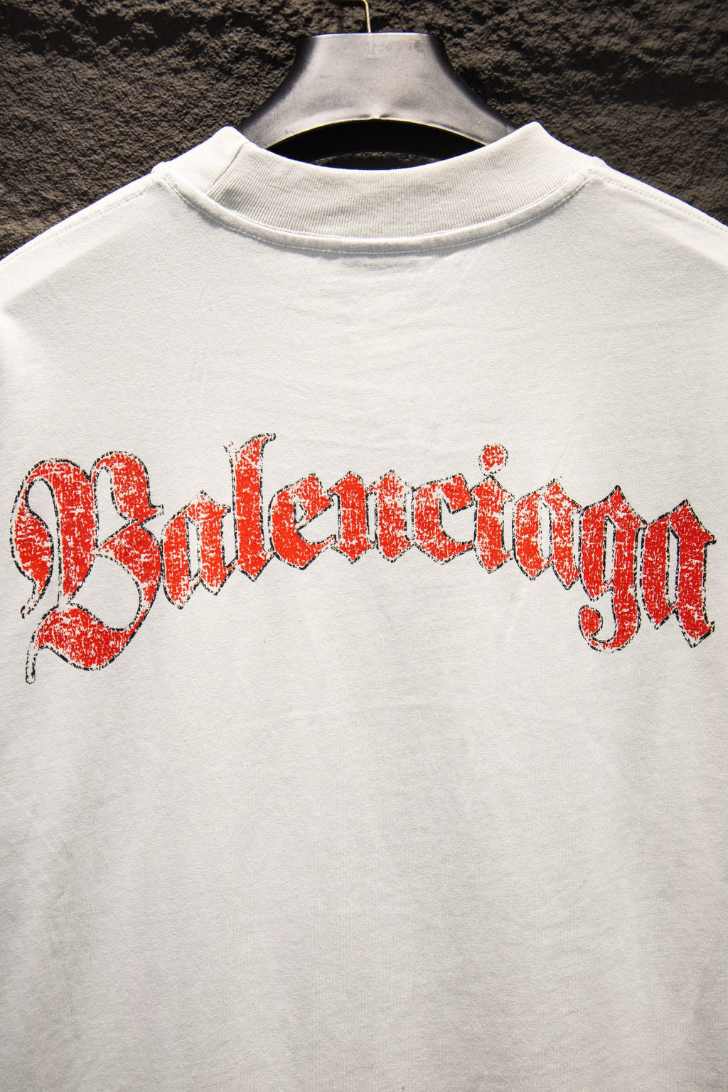 White Balenciaga T-shirt with red Balenciaga wordmark graphic across front