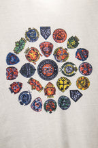White Balenciaga T-shirt with scattered multicolor crest and emblem prints