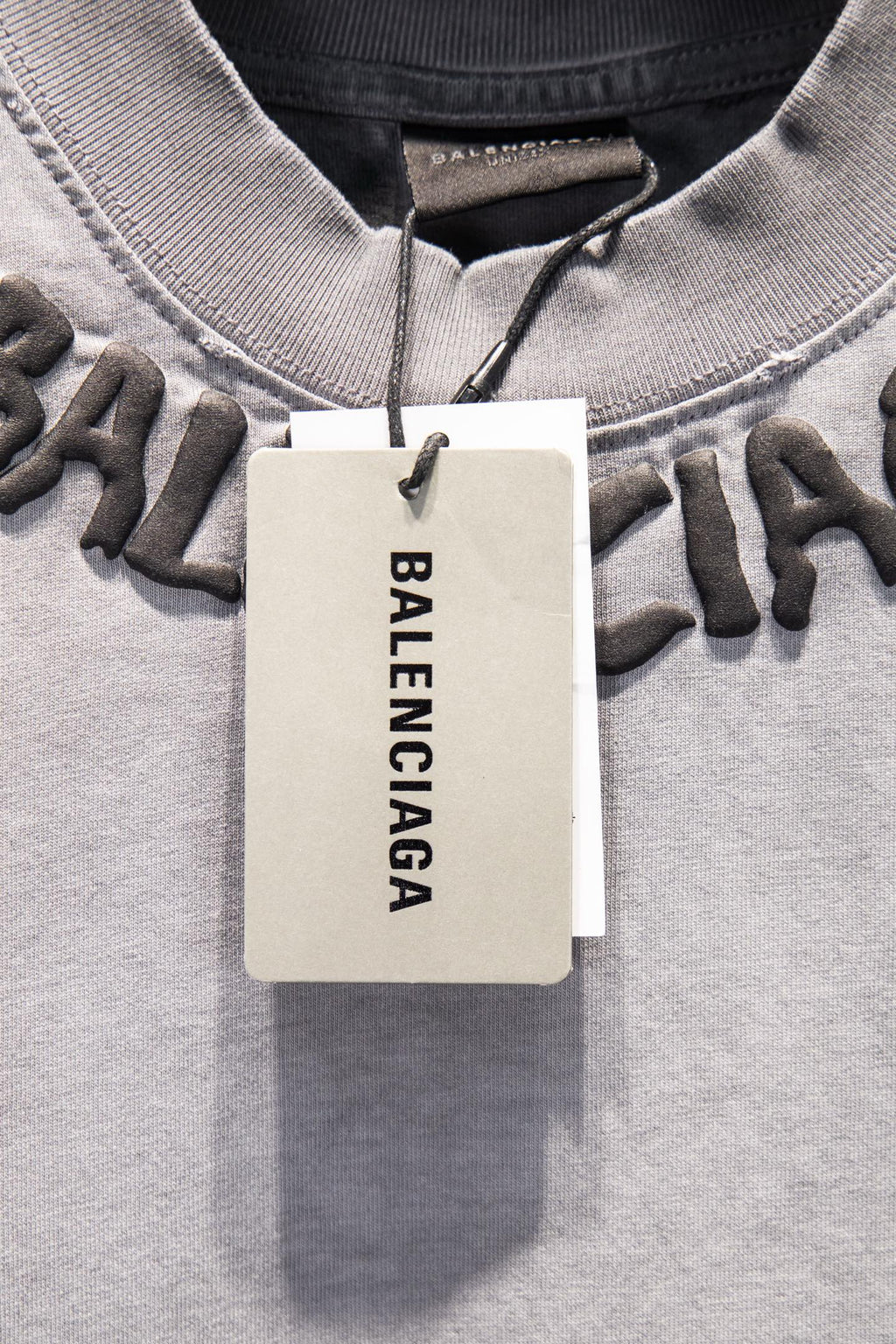 Balenciaga short-sleeve T-shirt, light gray, crew neck with hang tag and logo