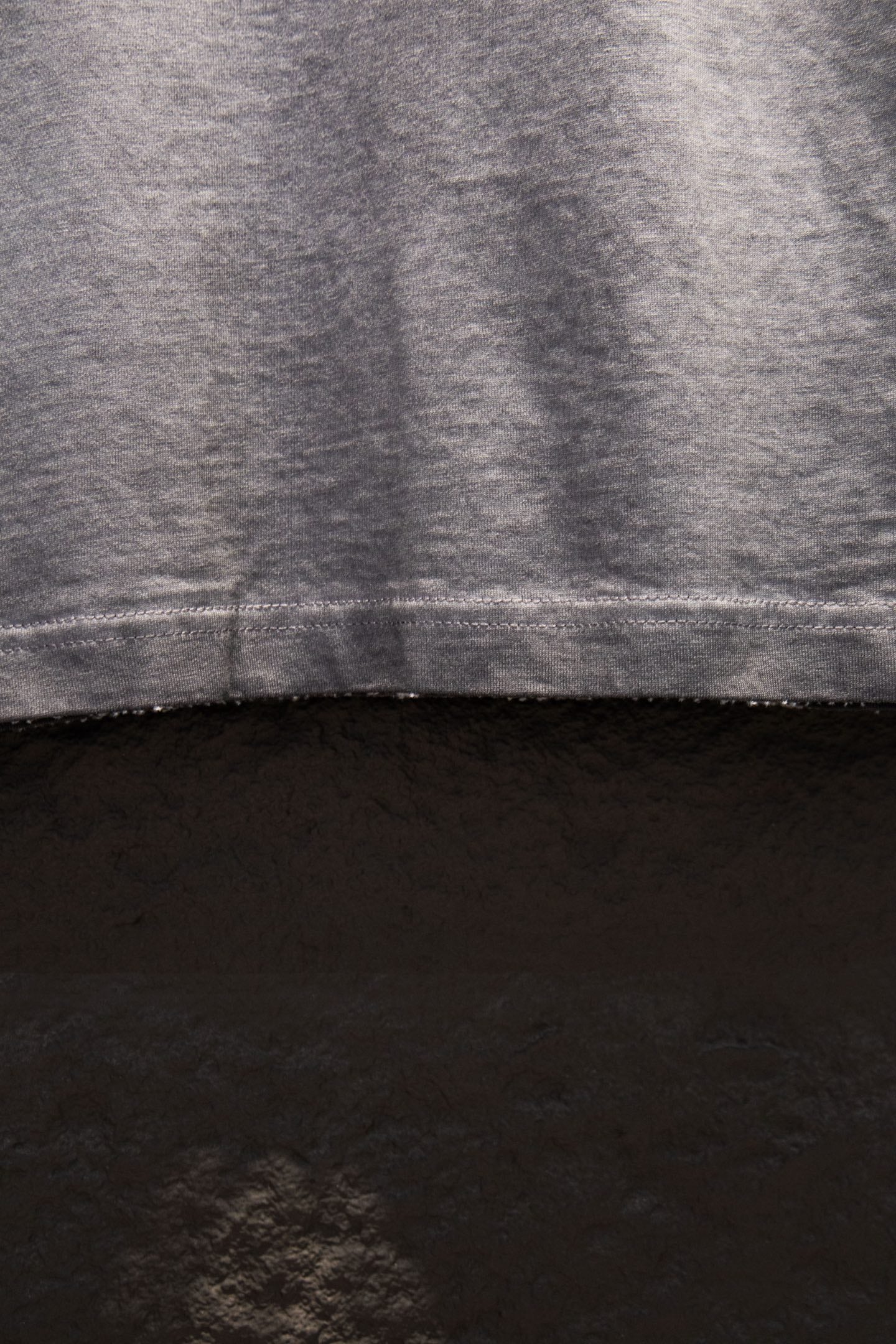 Balenciaga short-sleeve T-shirt, light gray, stitched hem and fabric texture close-up