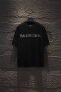 Black short-sleeve T-shirt with BALENCIAGA chest graphic.