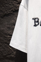 Balenciaga white T-shirt side view with small CB graphic detail