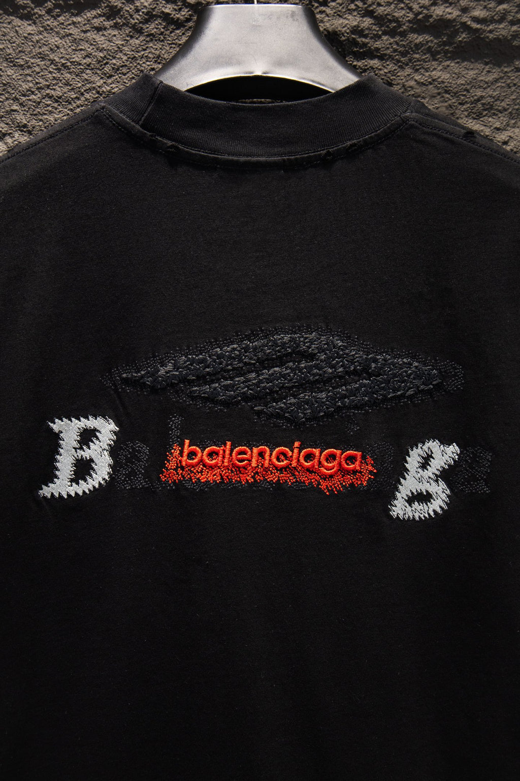 Balenciaga black T-shirt front with large B and balenciaga logo embroidery