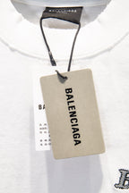 Balenciaga white T-shirt neckline with attached paper hang tag