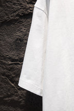 Balenciaga white short-sleeve T-shirt shown from side seam and hem