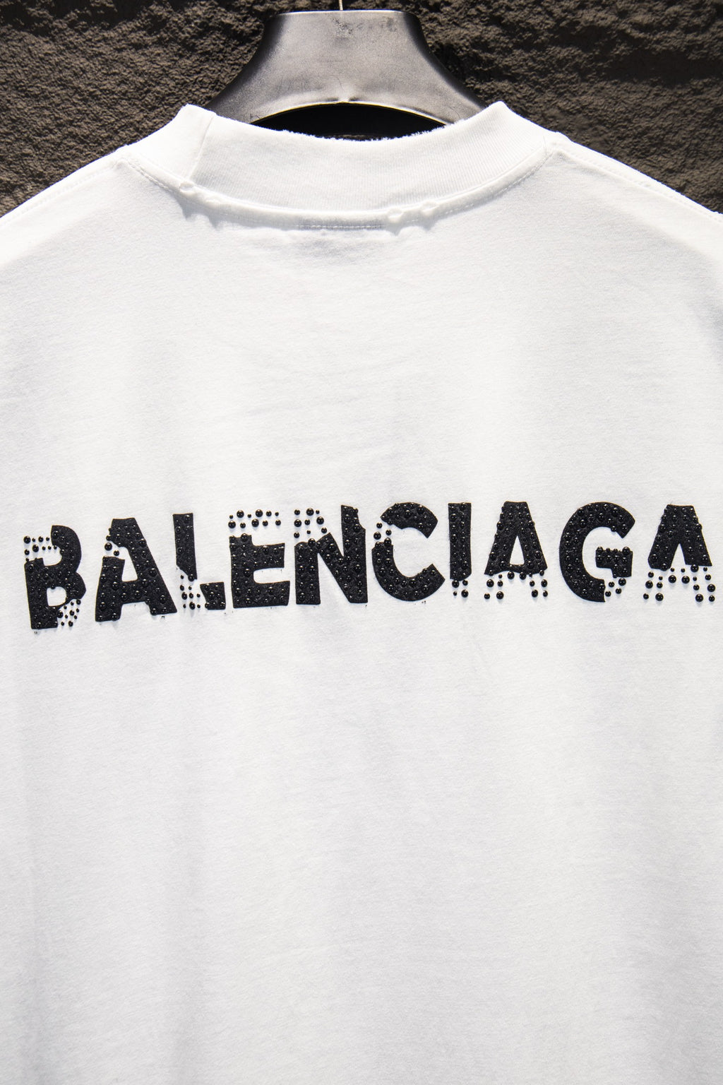 Balenciaga white T-shirt with large BALENCIAGA text logo across chest