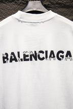 Balenciaga white T-shirt with large BALENCIAGA text logo across chest