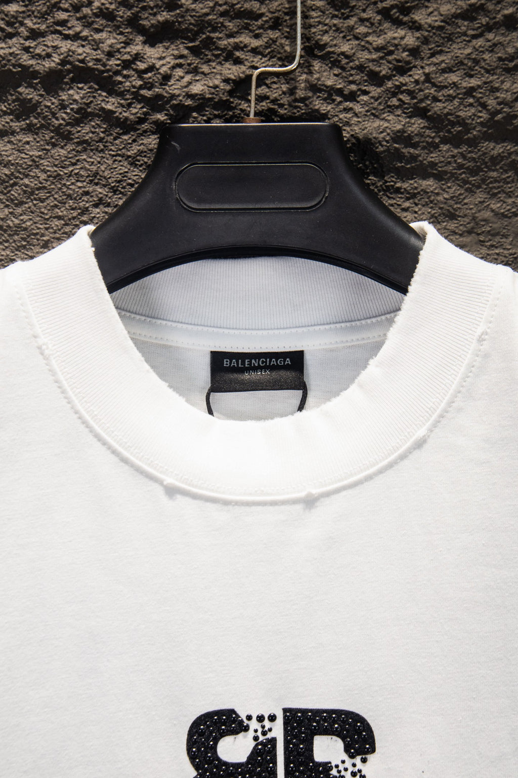 Balenciaga white T-shirt neckline detail with ribbed collar and logo