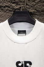 Balenciaga white T-shirt neckline detail with ribbed collar and logo