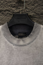 Light gray crewneck T-shirt collar with black inner trim and stitching