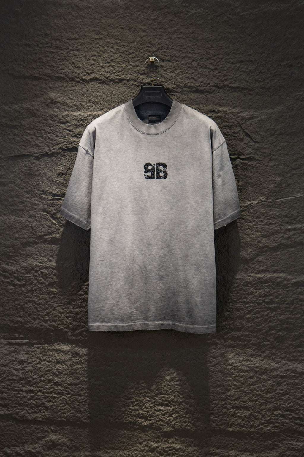 Light gray crewneck T-shirt with black Balenciaga logo on chest