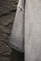 Light gray T-shirt with short sleeves and straight hem stitching