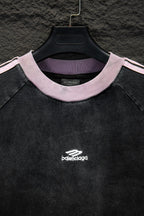 Balenciaga short-sleeve T-shirt neckline and chest logo detail in black and pink