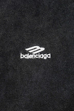 Balenciaga T-shirt logo patch on dark fabric