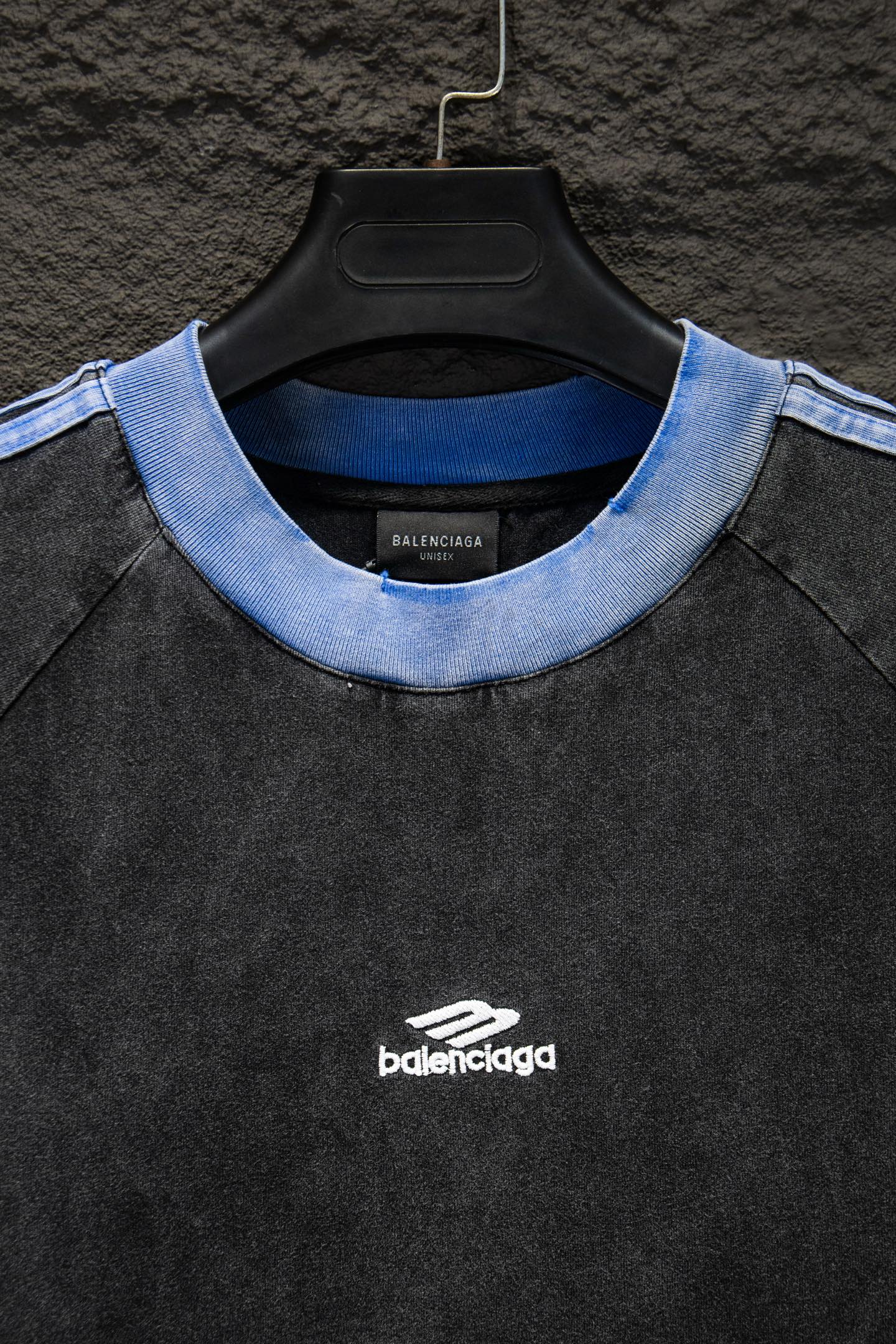 Balenciaga short-sleeve T-shirt close-up of light blue crew neck trim and chest logo