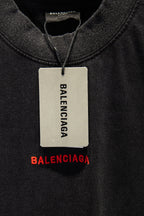 Balenciaga T-shirt with hanging size tag and red BALENCIAGA logo