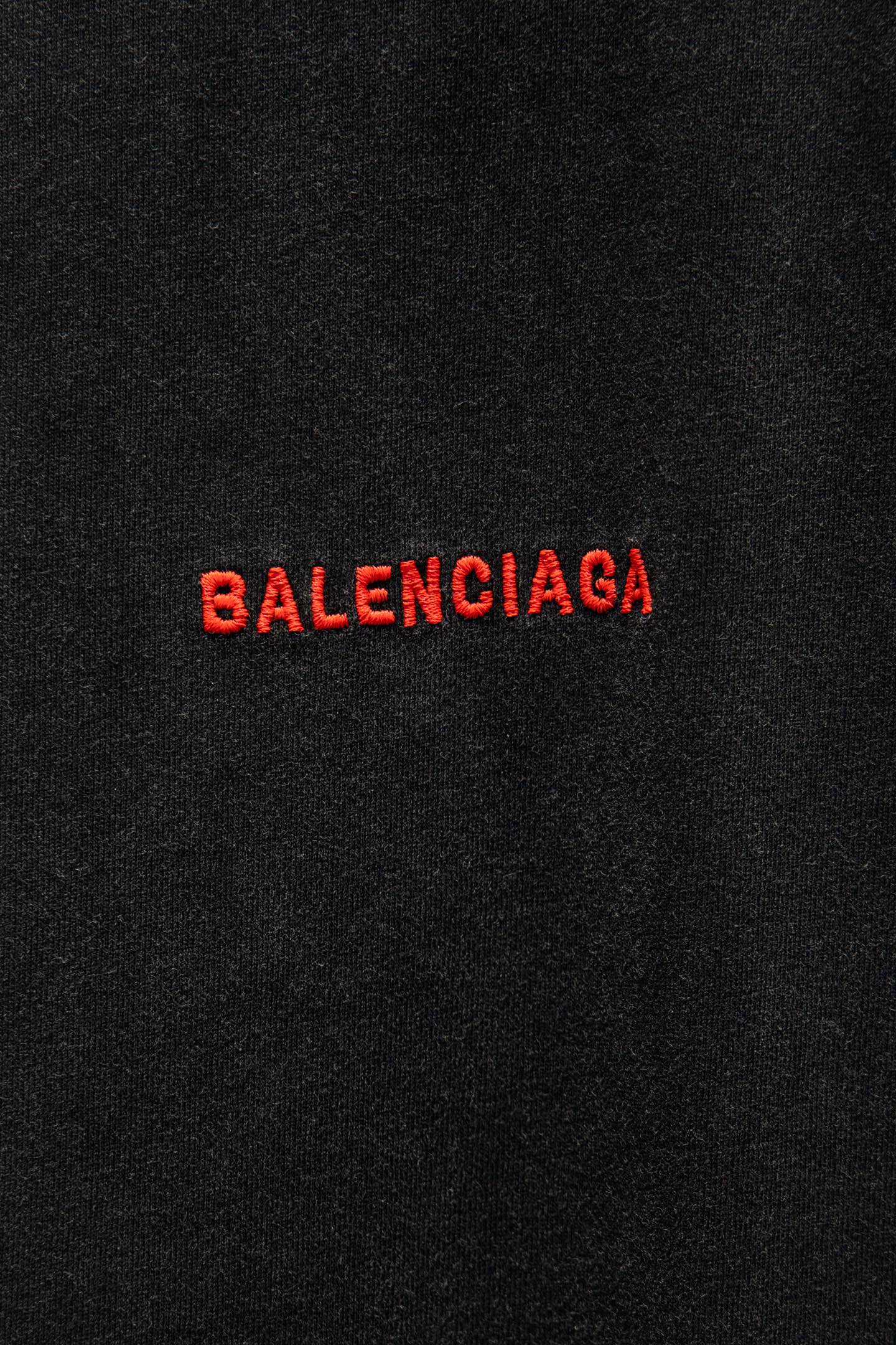 Balenciaga T-shirt fabric close-up with red BALENCIAGA lettering