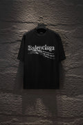 Balenciaga black T-shirt with distressed Balenciaga logo print at center chest