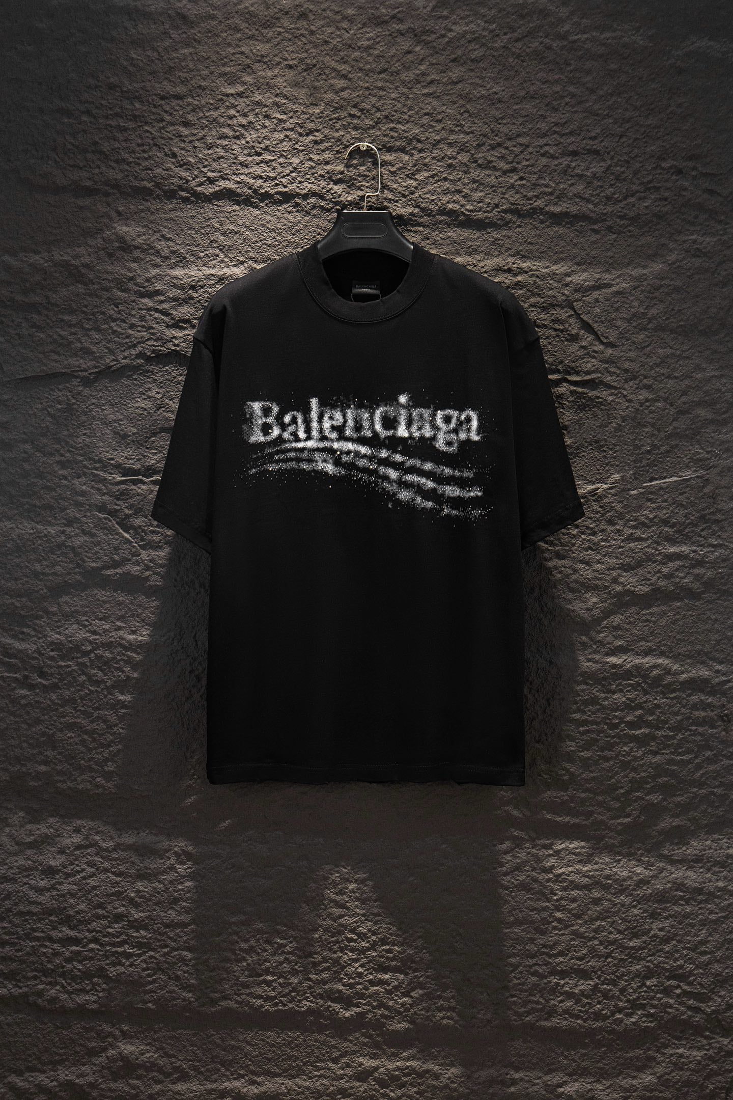 Balenciaga black T-shirt with distressed Balenciaga logo print at center chest