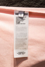 Pink T-shirt interior care label with printed Balenciaga branding