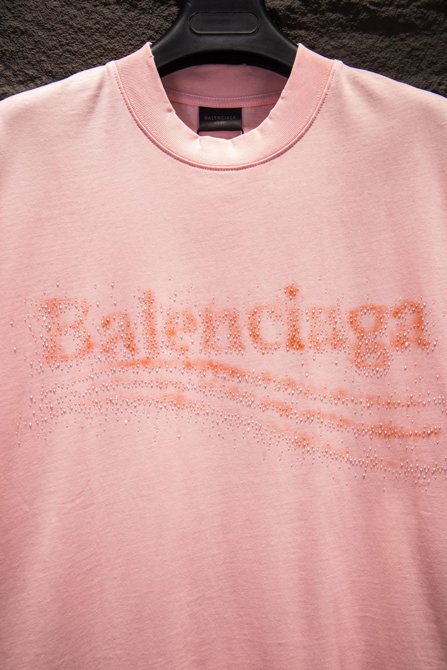 Pink crewneck T-shirt with glitter rhinestone Balenciaga logo across chest