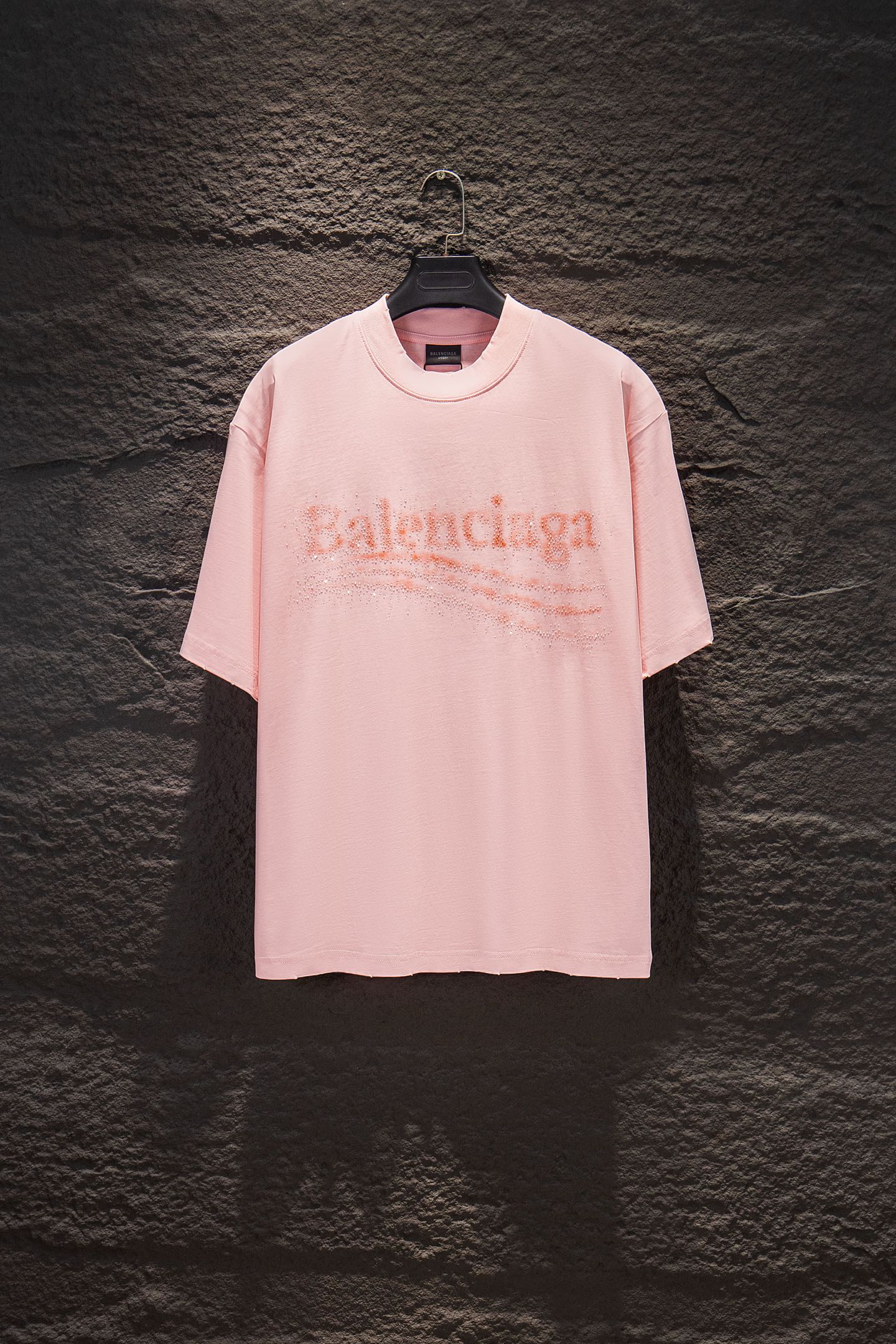 Pink short-sleeve crewneck T-shirt with Balenciaga rhinestone logo on chest